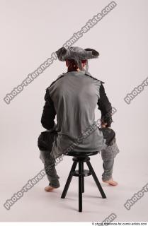 JACK PIRATE SITTING POSE WITH GUN AND DAGGER